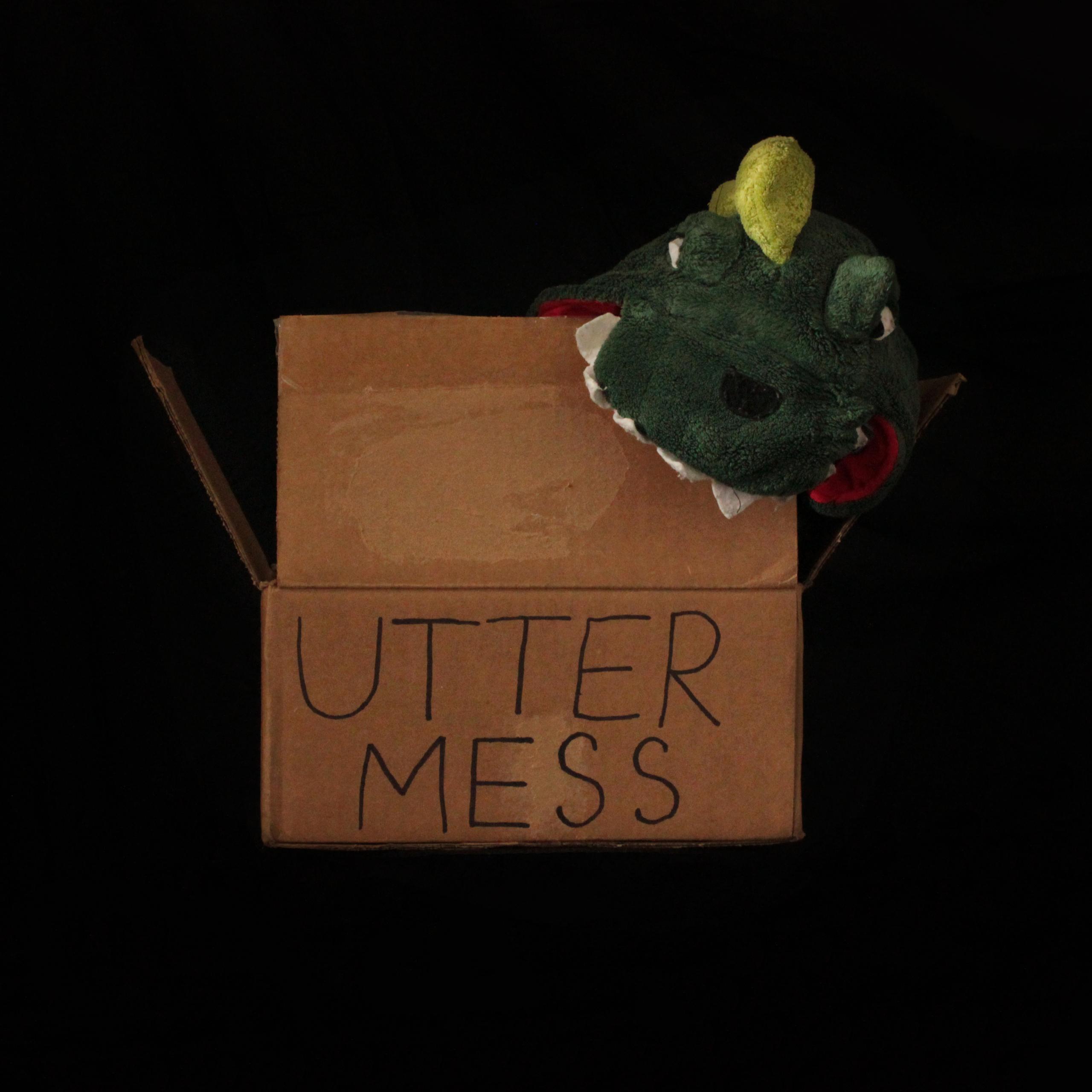 The image shows a cardboard box with the words 