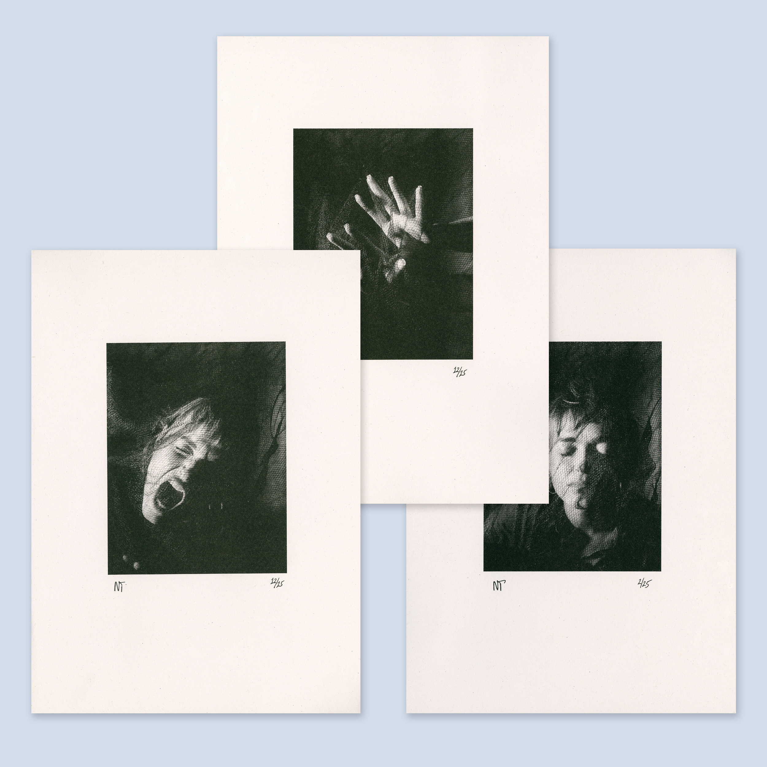 The image shows three black and white photographs arranged in a collage on a blue background. Each photograph is framed with a white border. 1. The top photograph features a close-up of a hands with fingers outstretched covered in netting. 2. The bottom-left photograph shows a person with mouth open, possibly screaming or shouting through netting. 3. The bottom-right photo depicts a person with a more neutral or contemplative expression covered in netting.