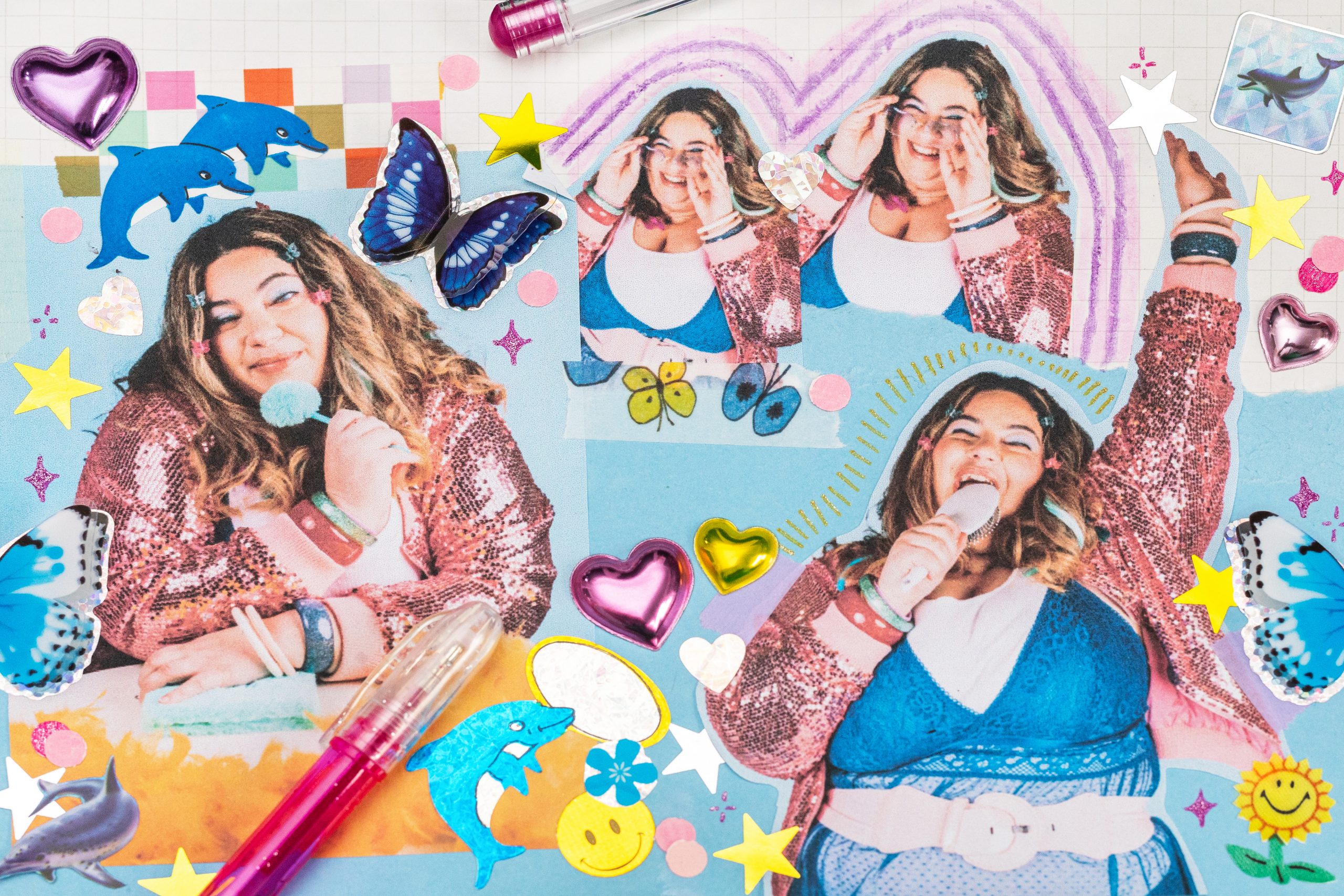 A colorful Y2K inspired collage featuring a young woman wearing a sparkly pink sequin jacket, a white t-shirt with a blue lace top over it, and a white belt. She has dark wavy hair with blonde highlights and some bright metallic hair extensions. There are several small, plastic butterfly clips in her hair in opaque purple, blue and pink. Photographs of the woman appear multiple times across the collage in different poses: smiling, holding a hairbrush as a microphone and singing, adjusting her oversized, blue- tinted glasses, as well as looking thoughtful whilst holding a pen with a fluffy pink top to her chin and looking down at a fluffy pink diary. The background is a mix of pastel blue and grid paper, with colorful stickers and hand-drawn elements adding to a fun, teenage scrapbook vibe.
